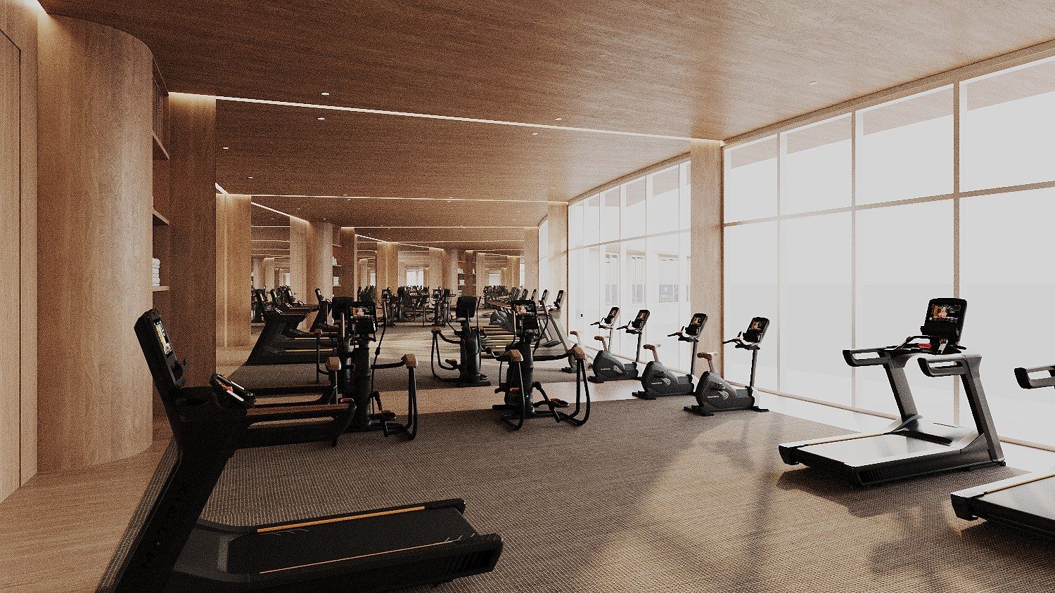Salle de cardio-training en enfilade, vélos le long des baies