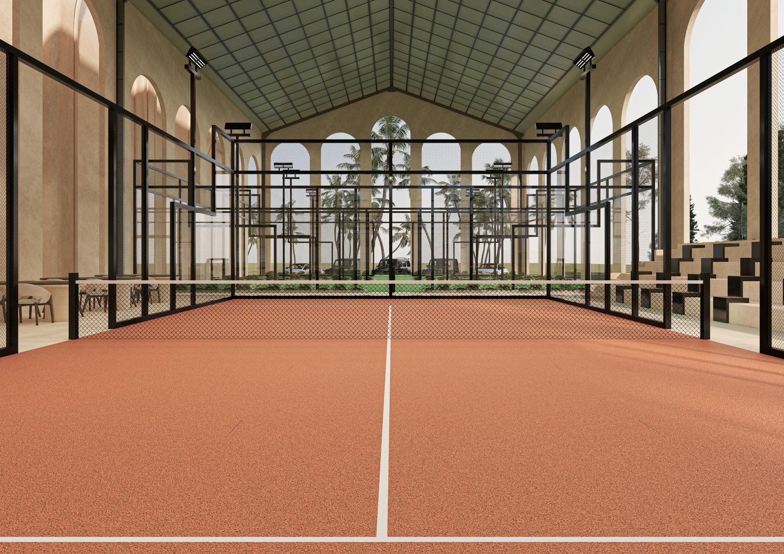 Court en terre battue sous la halle vitrée