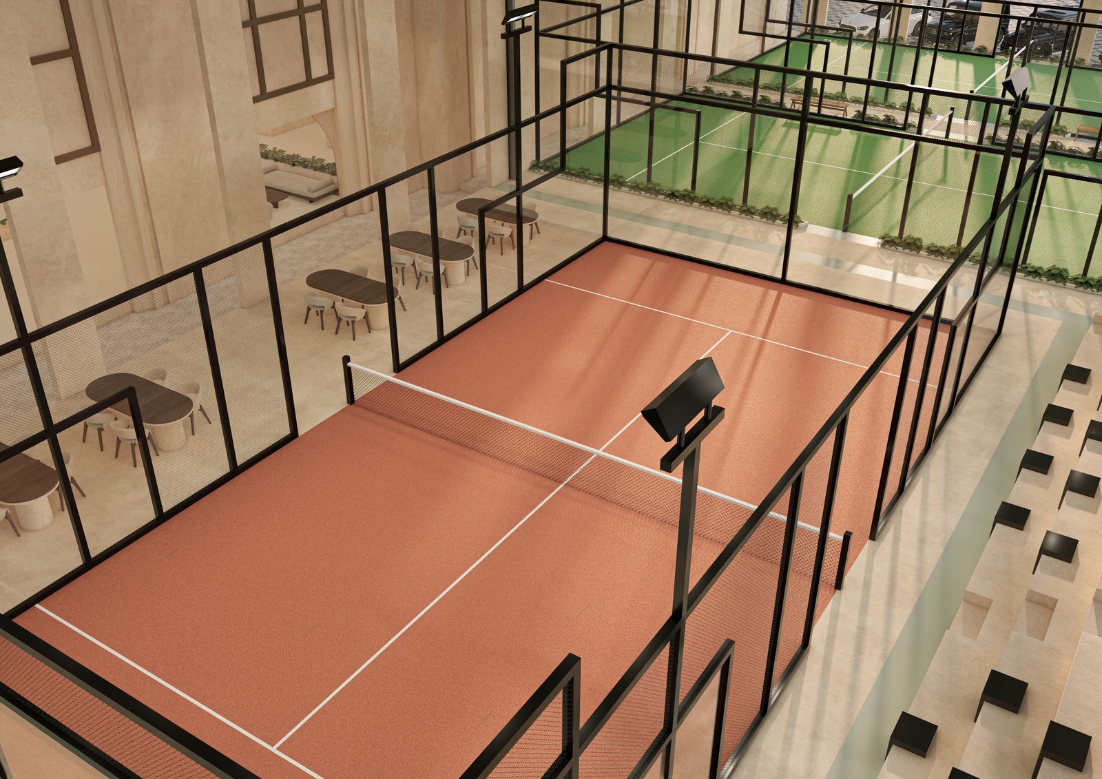 Vue plongeante sur les deux courts et les gradins
