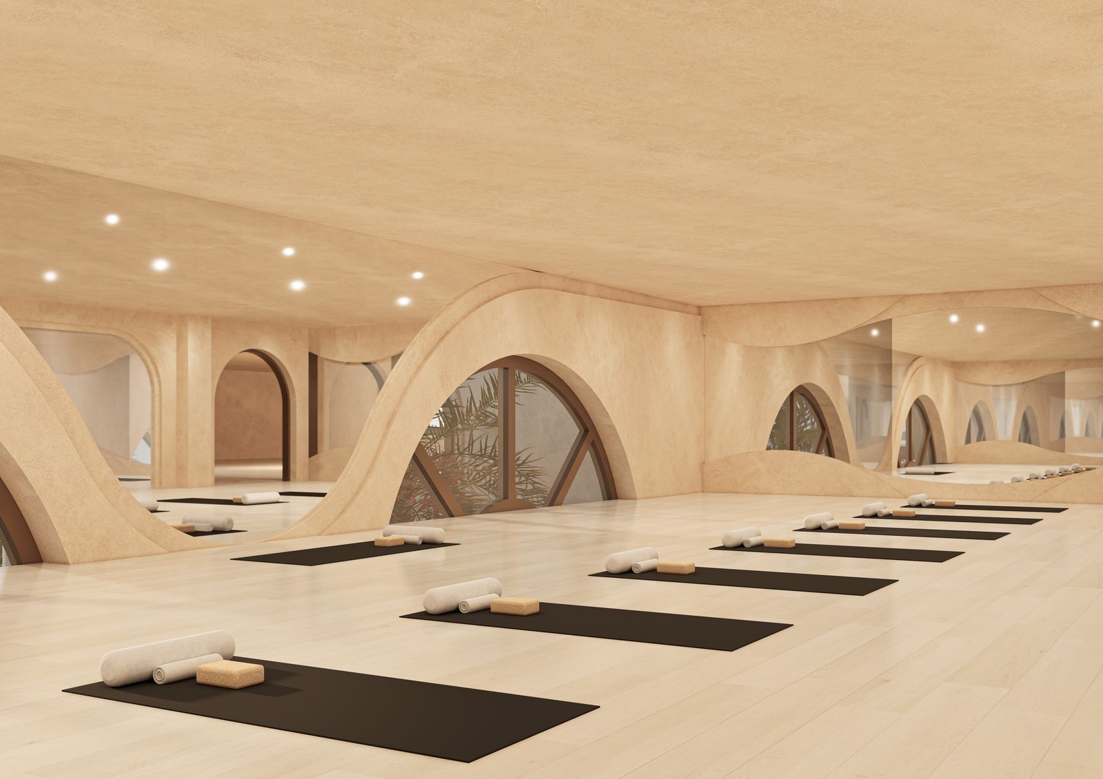 Studio de yoga, tapis alignés sous les voûtes